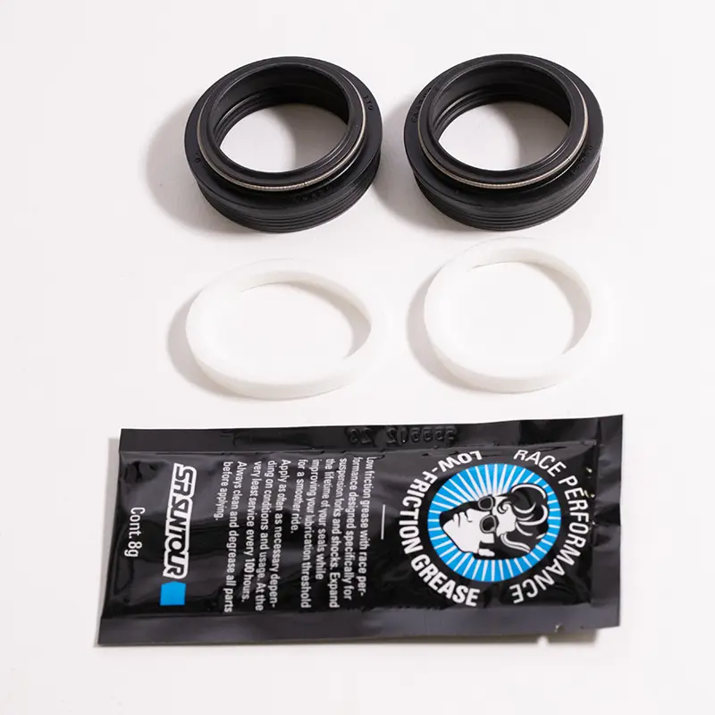 Packningssats för gaffelns dammskydd Suntour Axon34/Raidon34